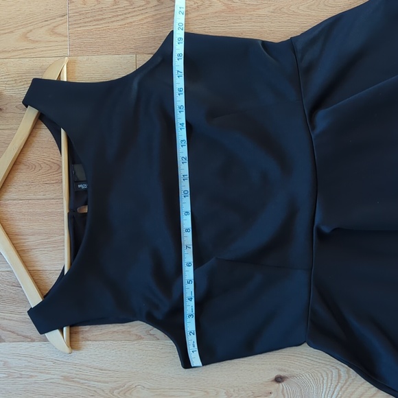 Bisou Bisou. Black Short Sleeve Peplum Top. Size XL. - Picture 5 of 10